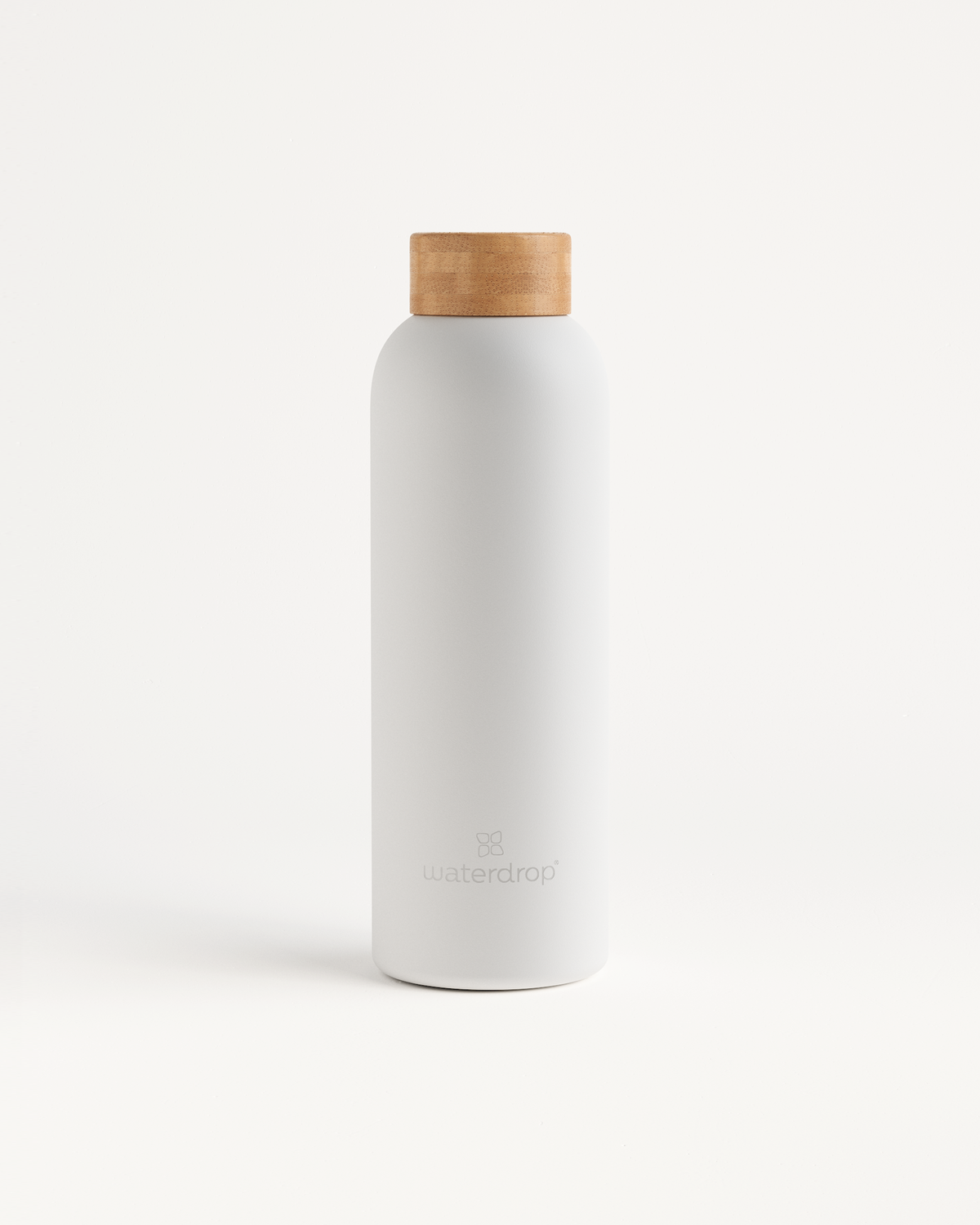 Bouteille Thermo Inox · Bouchon en bambou, minimalist design.