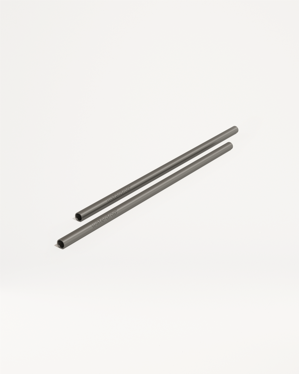 Cadeau à sélectionner: two waterdrop-embossed metal straws.