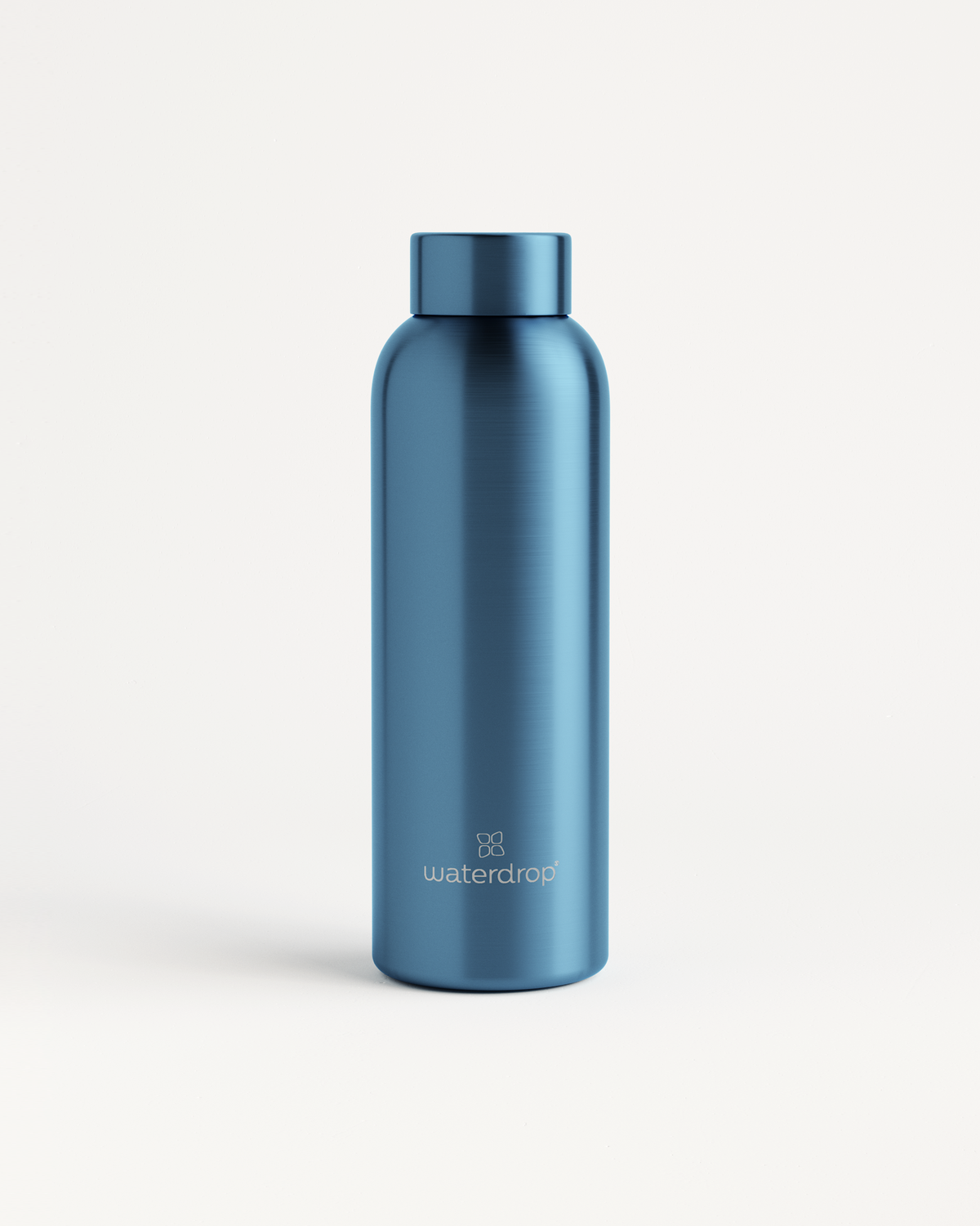 Bouteille Thermo Métal Inox, sleek stainless steel design.