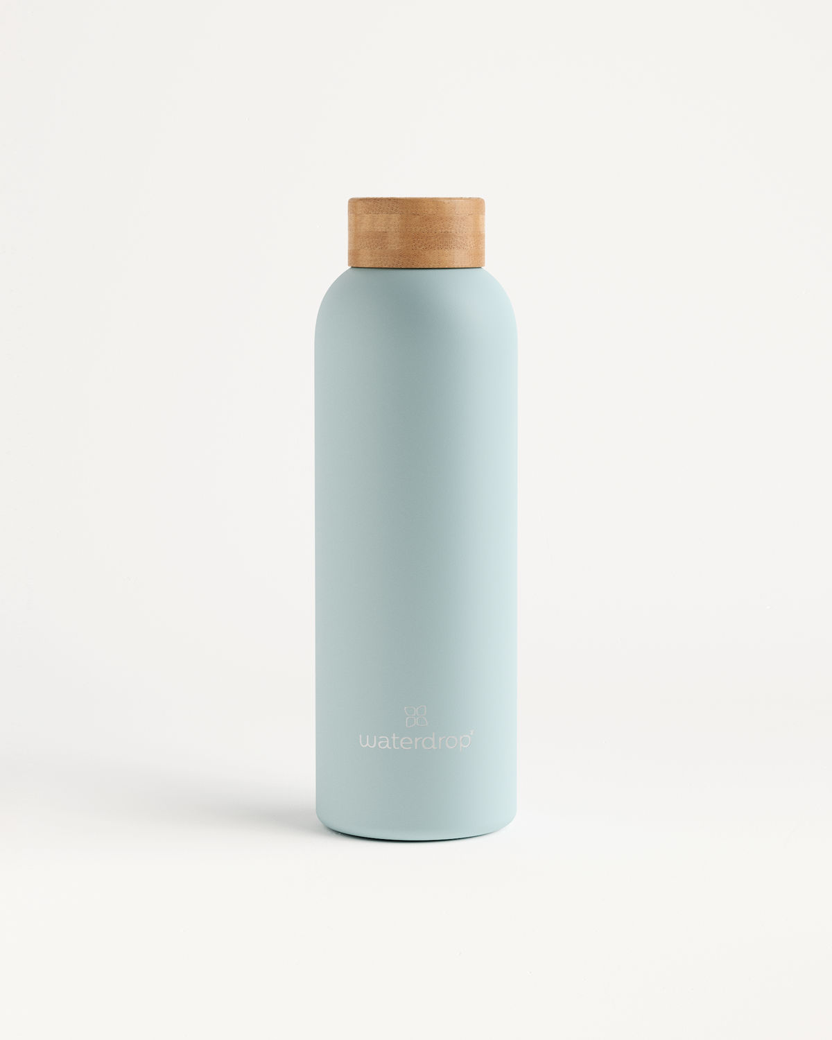 Bouteille Thermo Inox with brown cap.