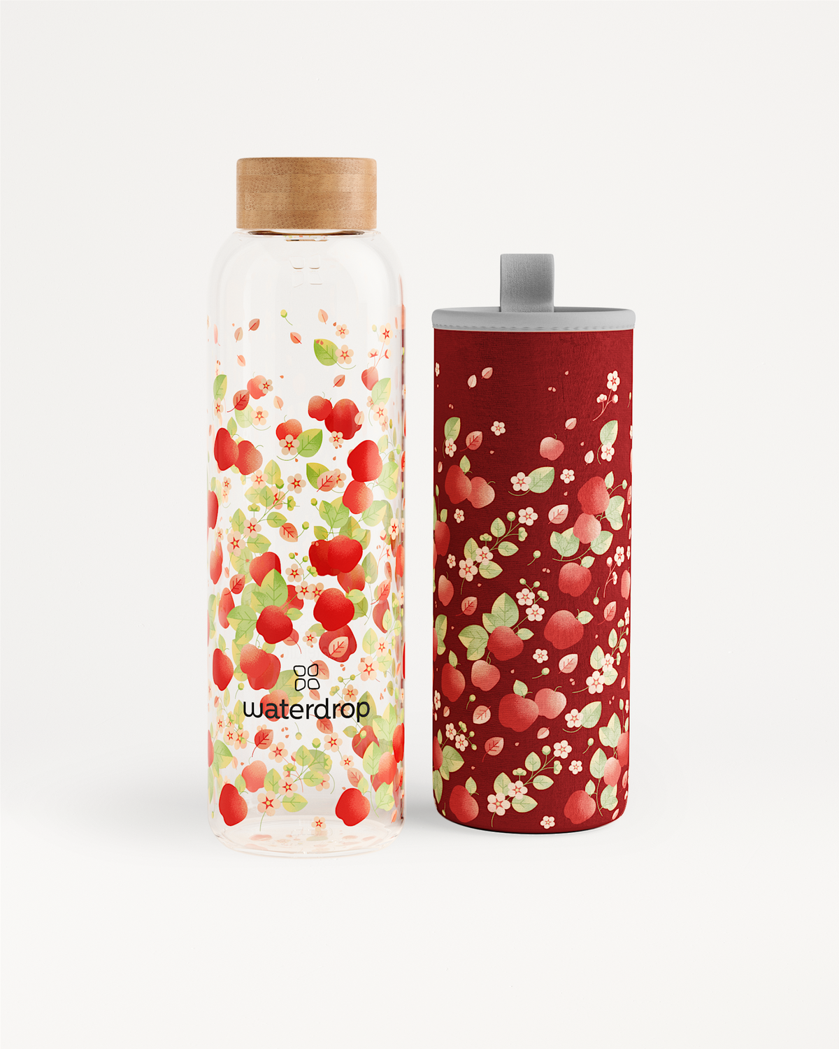 Bouteille Édition POMME with berry pattern and neoprene sleeve.