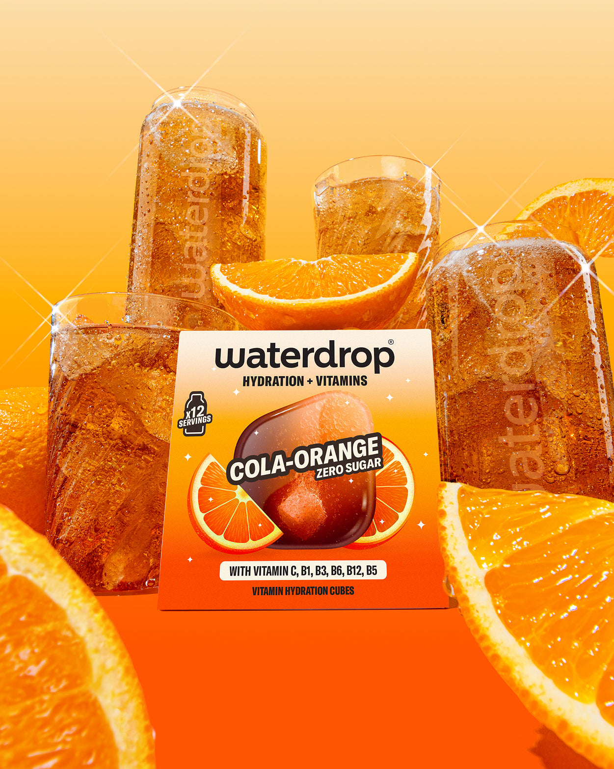 Double Pack COLA ORANGE hydration cubes with fizzy drink glasses.