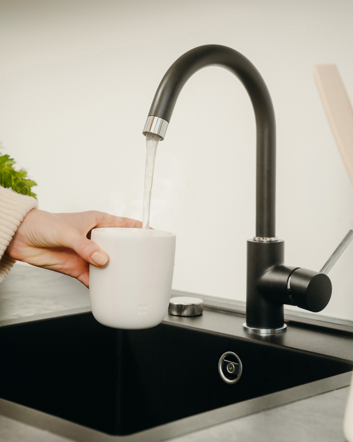 Porcelain Mug under Matte-Black Faucet