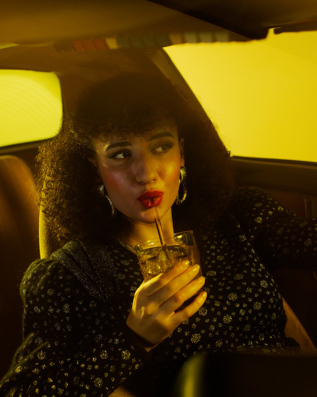 Woman enjoying Double Pack Microenergy BOOST in car.