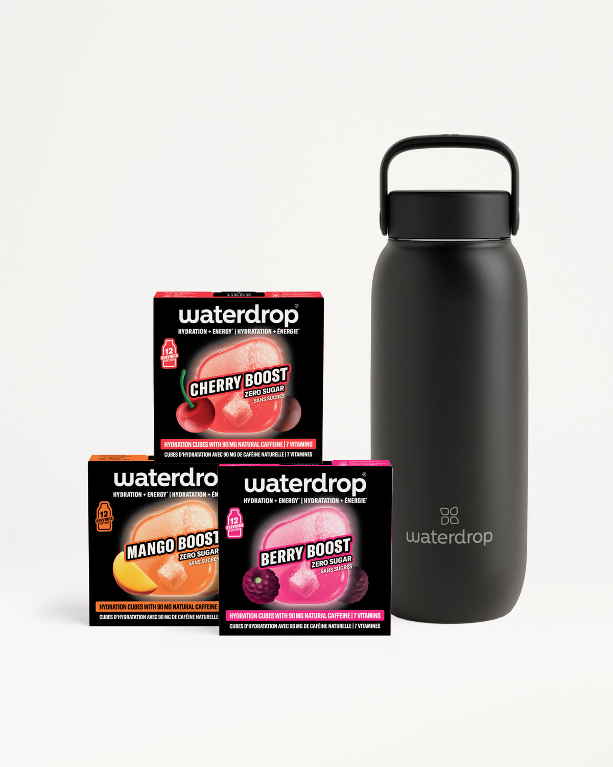 Bouteille d'eau réutilisable gris foncé avec poignée, à côté de trois boîtes de boosters de saveur.