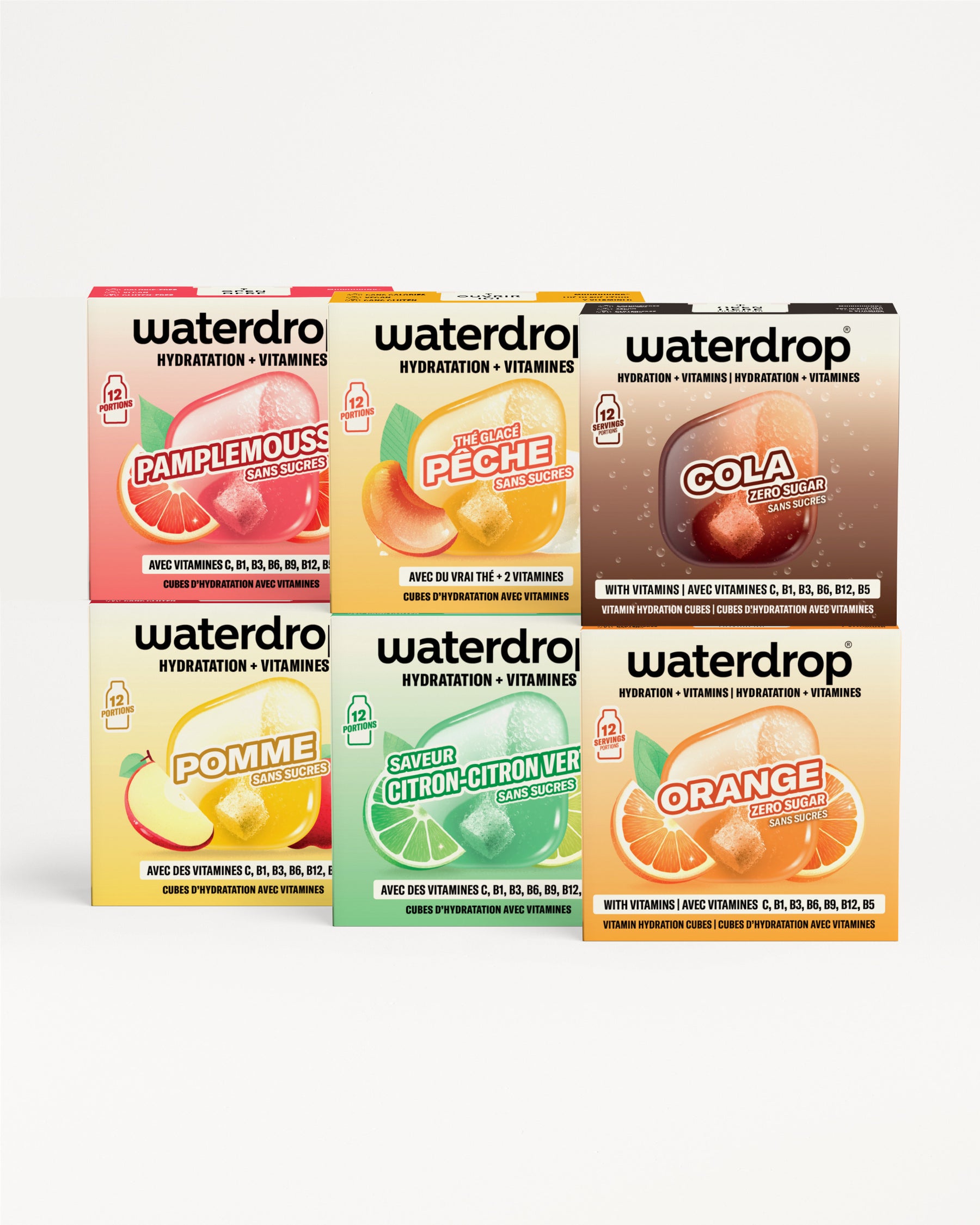 Six boîtes de cubes d'hydratation disposées en deux lignes de trois sur fond blanc.