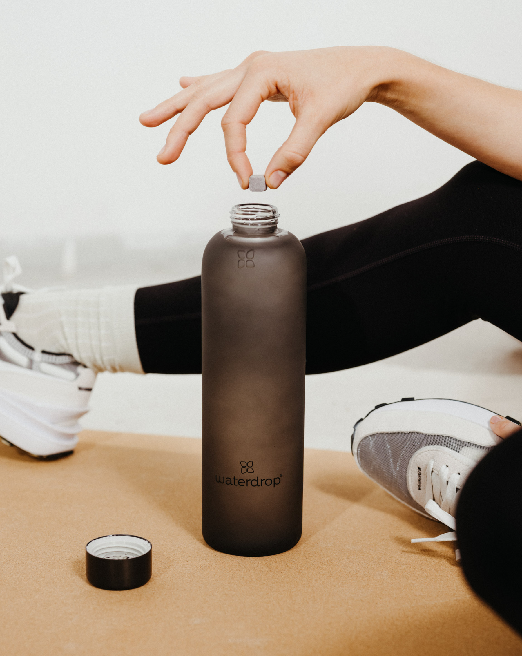 Givrée en Verre glass bottle with timeless frosted design.