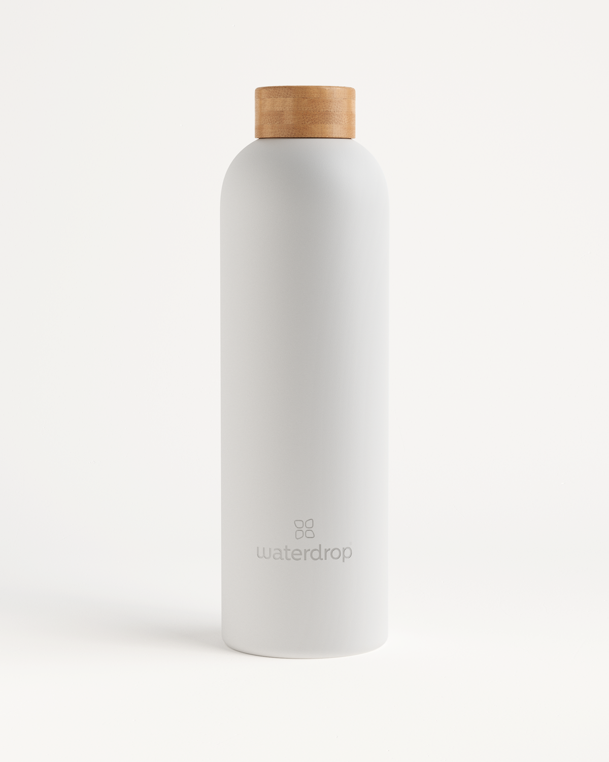 Bouteille Thermo Inox with brown cap.