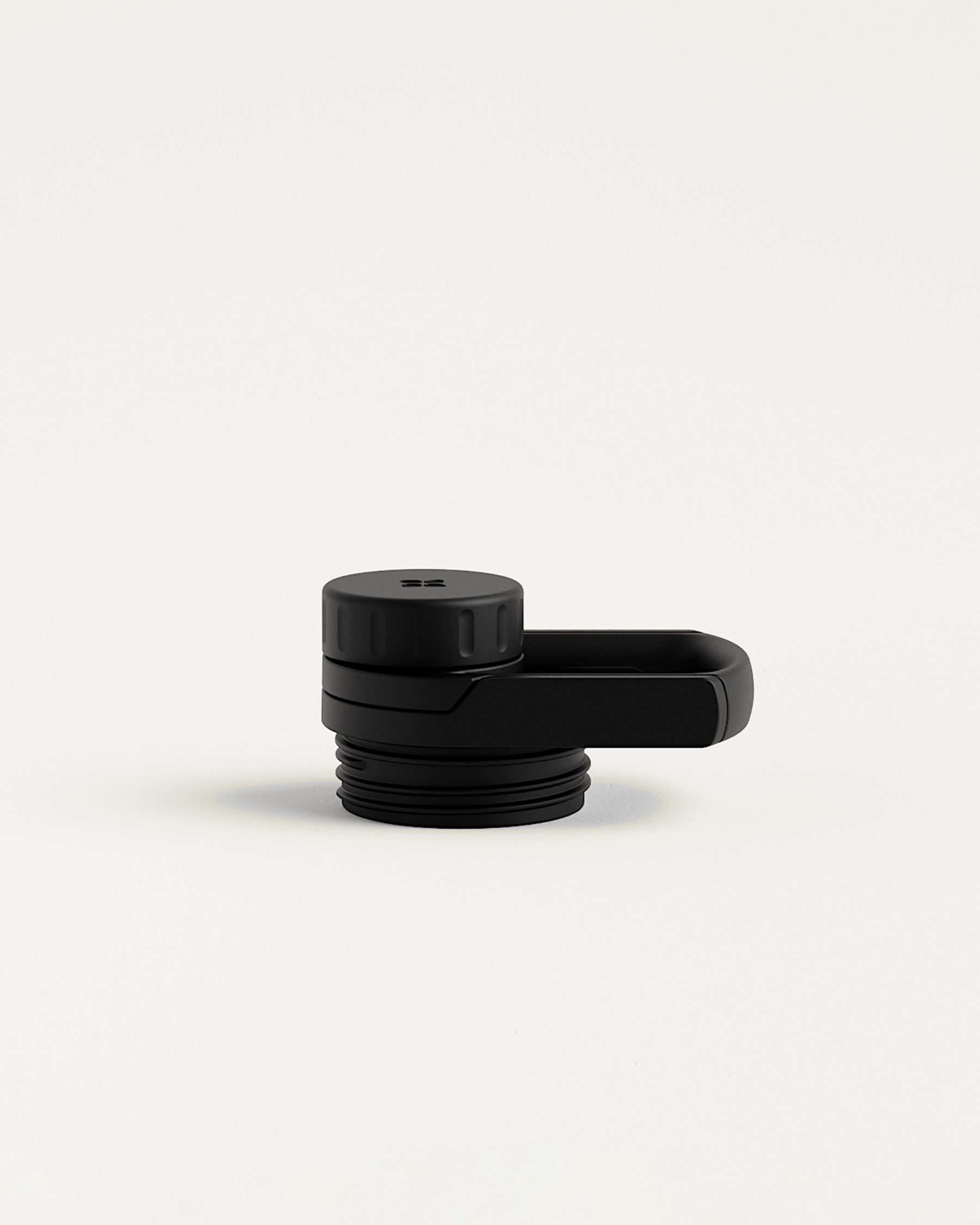 Couvercle à Bascule with attached handle for bottle.